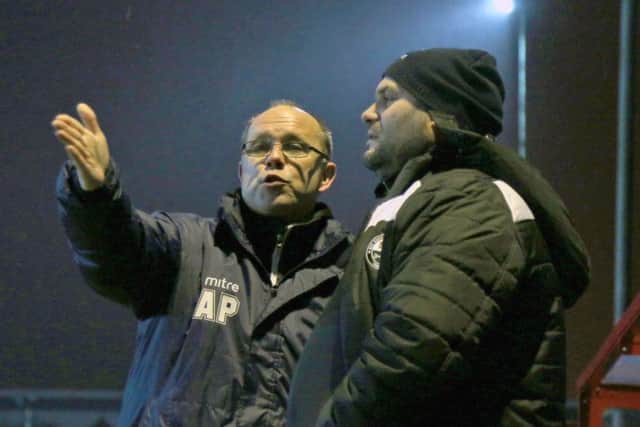 Andy Peaks makes his point to coach Scott Carlin during AFC Rushden & Diamonds' clash at Kettering Town. Pictures by Peter Short