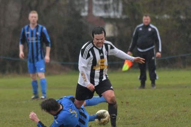 Match action from Moultons 8-2 success over Corby Pegasus in the Premier Division. Pictures by Dave Ikin