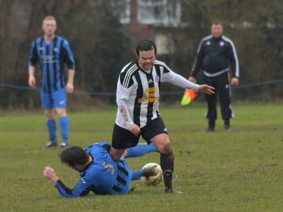 Match action from Moultons 8-2 success over Corby Pegasus in the Premier Division. Pictures by Dave Ikin