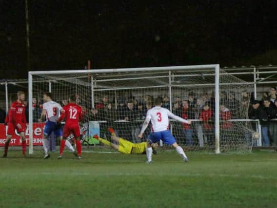 Liam Dolman's shot finds the net for AFC Rushden & Diamonds' late equaliser at Kettering Town on Tuesday night. Diamonds return to league duty tomorrow at bottom side Arlesey Town. Picture by Peter Short