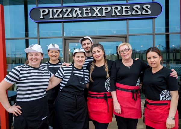Staff outside the new Pizza Express at Rushden Lakes