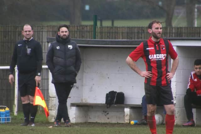 Whitworth boss James Mallows watches on during his team's 4-2 home defeat to Sleaford Town in the Premier Division at the weekend. Pictures by Peter Short