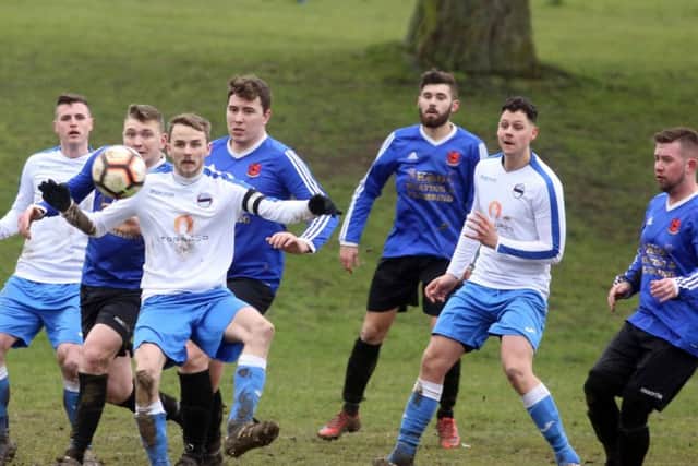 Action from Irthlingborough Rangers' 3-1 victory over Peterborough Brotherhood in the semi-finals of the NFA Area Cup. Pictures by Alison Bagley