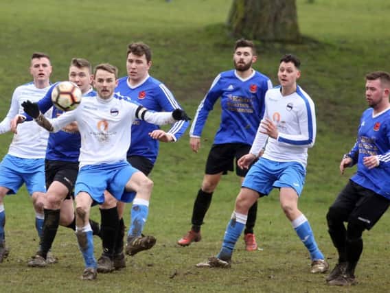 Action from Irthlingborough Rangers' 3-1 victory over Peterborough Brotherhood in the semi-finals of the NFA Area Cup. Pictures by Alison Bagley