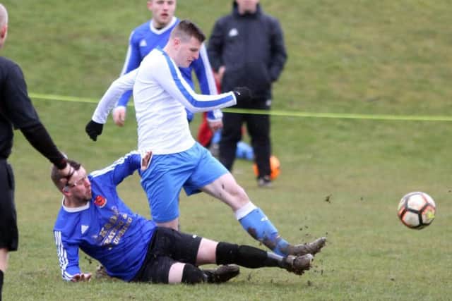 Action from Irthlingborough Rangers' 3-1 victory over Peterborough Brotherhood in the semi-finals of the NFA Area Cup