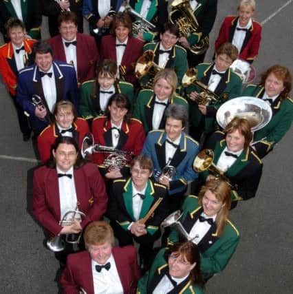 Rothwell, Boobs and Brass, county's first all female brass band to do charity concert for breast care charities. 
In front founder members l-r Jane Nichols and Margaret Betts with the band.  
Friday, 07 July 2006