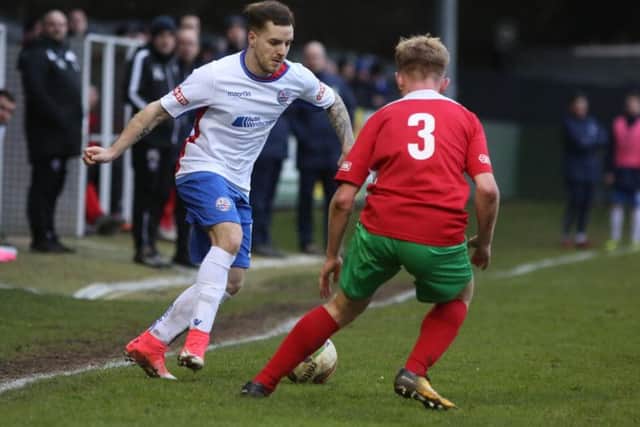 John Dean takes on a Chalfont defender after coming on as a substitute for Diamonds