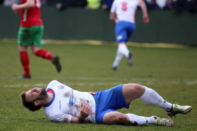 Tom Lorraine suffered a back injury during Saturday's win over Chalfont St Peter, which has made him a doubt for AFC Rushden & Diamonds' clash with Uxbridge tonight. Picture by Alison Bagley