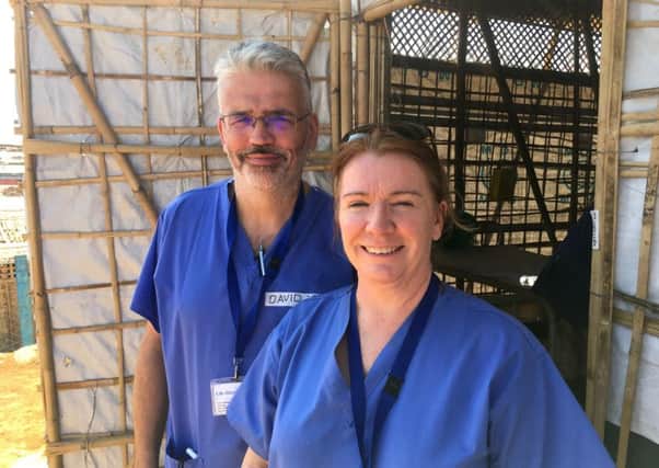 Head of Nursing for Urgent and Emergency Care David Anderson with Advanced Nurse Practitioner Mandy Blackman at a refugee camp during their deployment in Bangladesh.