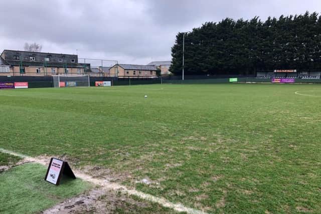 The Hayden Road pitch was left waterlogged by the rain of yesterday and last night