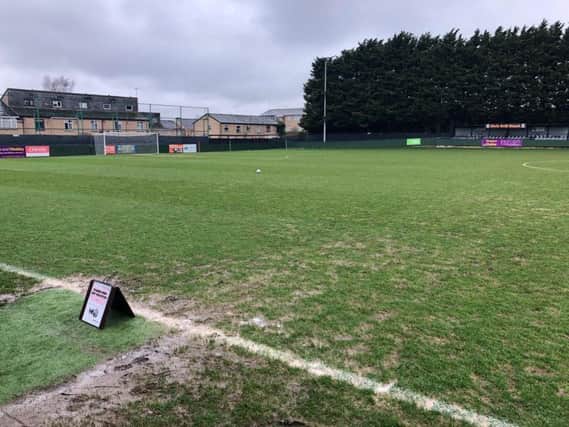 The Hayden Road pitch was left waterlogged by the rain of yesterday and last night