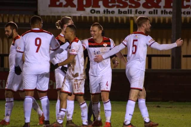 Kettering Town celebrate one of their goals during the win over Tiverton. Picture by Peter Short