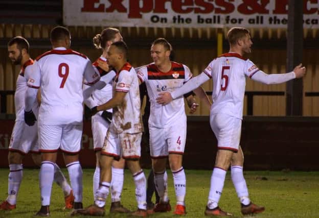 Kettering Town celebrate one of their goals during the win over Tiverton. Picture by Peter Short