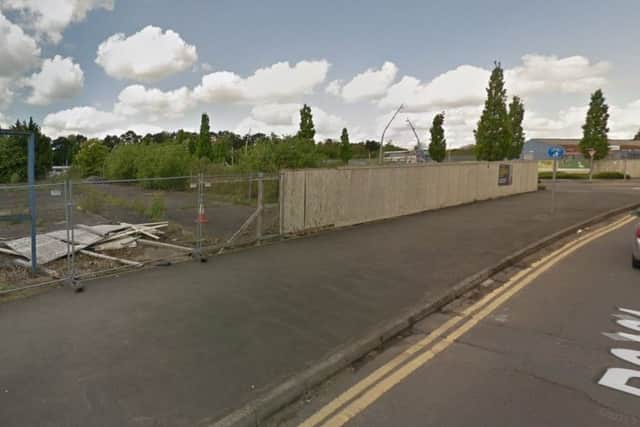 The derelict site where new flats are proposed in Station Road, Corby. Copyright: Google NNL-180223-171311005