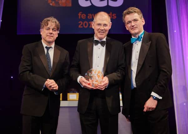 Keith centre with Alan Davies left at TES Awards NNL-180226-105534005