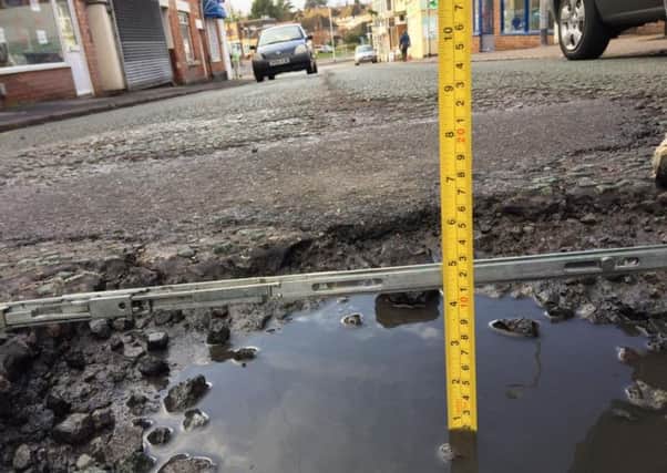Ryan Dickens  sent in this picture of a pothole in Church Street, Rushden, which damaged two tyres on his BMW