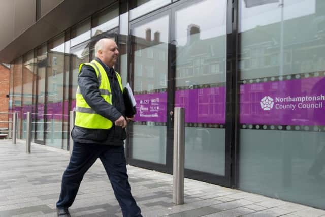 Mark Morrell - AKA Mr Pothole - marches into One Angel Square with his Section 56 notices. (Picture: Leila Coker)
