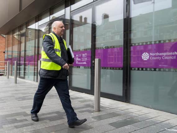 Mark Morrell - AKA Mr Pothole - marches into One Angel Square with his Section 56 notices. (Picture: Leila Coker)