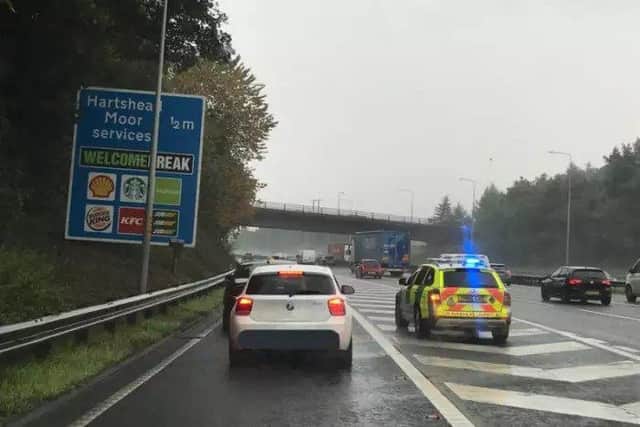 Police with a vehicle which has run out of fuel