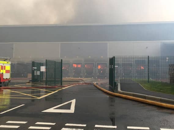 A man has been arrested on suspicion of arson following the fire in Daventry today.