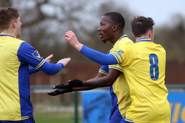 Wellingborough Town celebrate their opening goal in the 3-1 win over Daventry Town at the Dog & Duck. Pictures by Alison Bagley