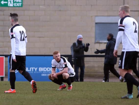 Sam Warburton shows his disappointment following Corby Town's 2-0 home defeat to Gresley FC. Pictures by Alison Bagley