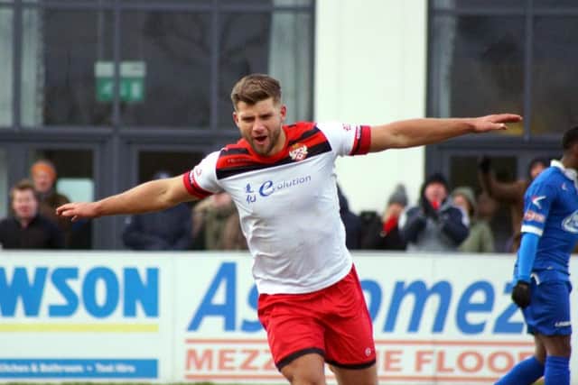 Michael Richens celebrates scoring Kettering Town's second goal in the 4-0 victory at Stratford Town. Pictures by Peter Short