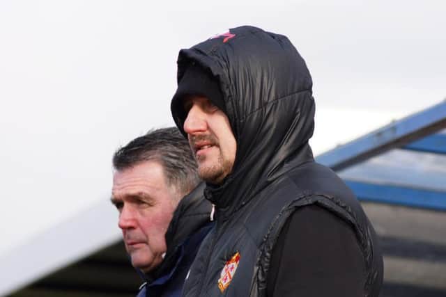 Manager Marcus Law and head coach John Ramshaw watch on