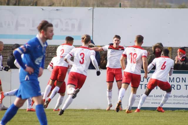 Mathew Stevens enjoys the moment after scoring the Poppies' third goal