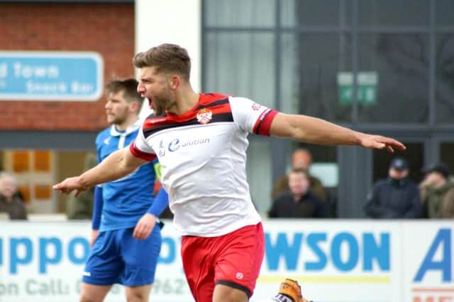 Michael Richens celebrates after scoring during Kettering Town's 4-0 victory at Stratford Town on Saturday. Picture by Peter Short