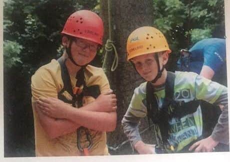 Lewis and Ben when they were both in Year 6. NNL-180320-120422005