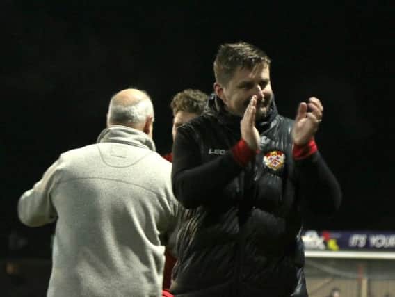 Marcus Law was a happy man after Kettering Town hit back to beat Royston Town 4-1. Pictures by Peter Short