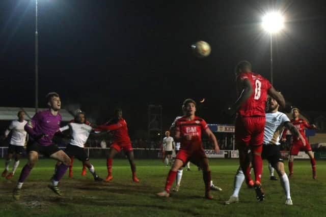 Aaron O'Connor heads home his 28th goal in all competitions this season during Kettering Town's 4-1 win over Royston Town. Picture by Peter Short