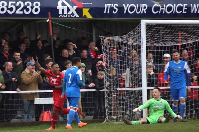Aaron O'Connor heads off to celebrate after he scored Kettering Town's third goal in the 3-0 victory over Frome Town at Latimer Park. Pictures by Peter Short