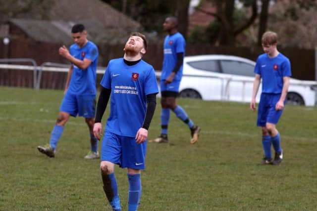 The Stewarts & Lloyds players show their disappointment after conceding a goal during their 7-1 home defeat to Melton Town. Pictures by Alison Bagley