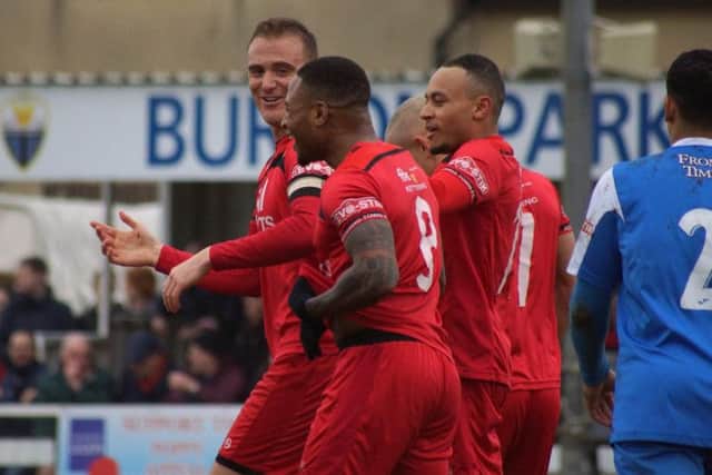 Brett Solkhon enjoys the moment after scoring Kettering Town's second goal from the penalty spot as they saw off Frome Town 3-0 at Latimer Park. Pictures by Peter Short