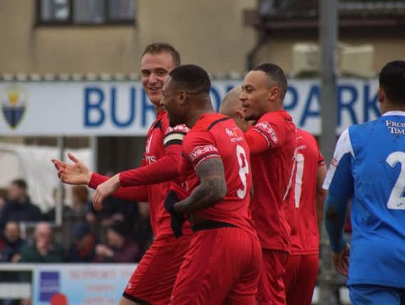 Brett Solkhon enjoys the moment after scoring Kettering Town's second goal from the penalty spot as they saw off Frome Town 3-0 at Latimer Park. Pictures by Peter Short