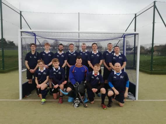 Kettering pose for the camera after they secured promotion in Division 3NW in the East Men's League