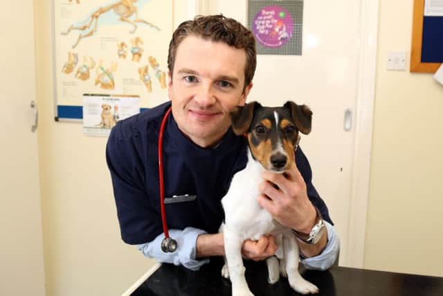 Adrian with his own dog, Dotty. NNL-180329-102658005
