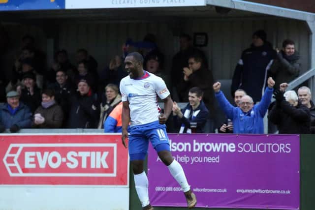 Ryan Robbin's stoppage-time penalty earned AFC Rushden & Diamonds a vital point in their 1-1 draw at Beaconsfield Town