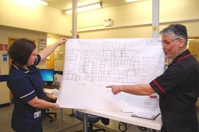 A&E refurb Sister Sarah Haylett and Lead Nurse David Anderson look at the plans. NNL-181004-132806005