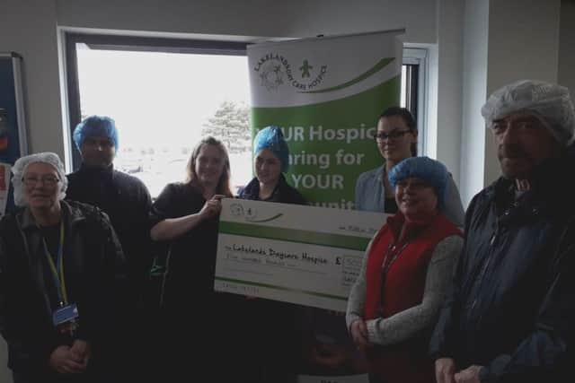 The Puredrive presentation to Marina Rae from Lakelands Hospice