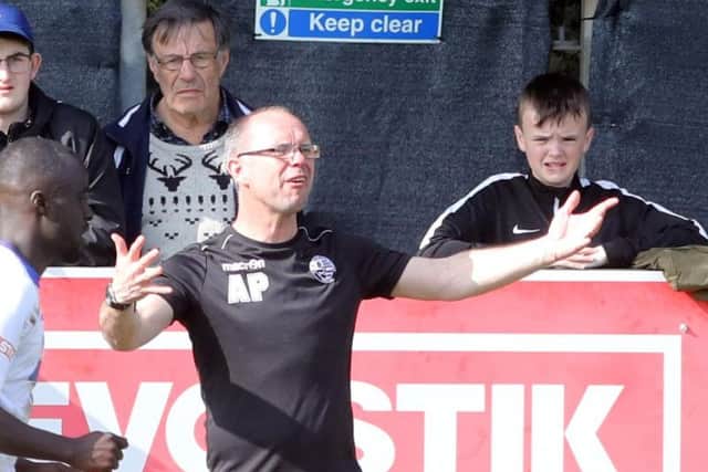 Boss Andy Peaks makes his point to his players at Hayden Road