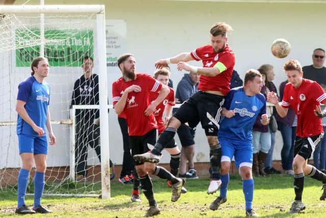 Action from the 0-0 draw between Irchester United and Lutterworth Athletic in Division One. Pictures by Alison Bagley