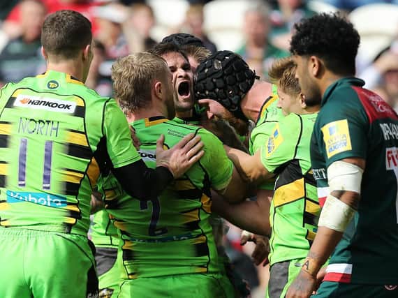 Cobus Reinach roars as Saints celebrate at Welford Road (pictures: Kirsty Edmonds)