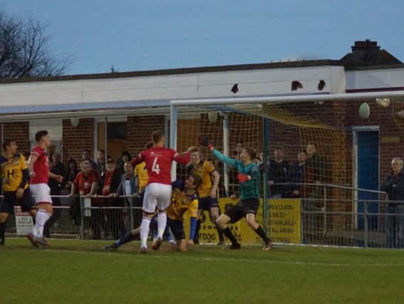Brett Solkhon scores Kettering Town's third goal during the 7-0 success at Gosport Borough on Tuesday night. Picture by Peter Short