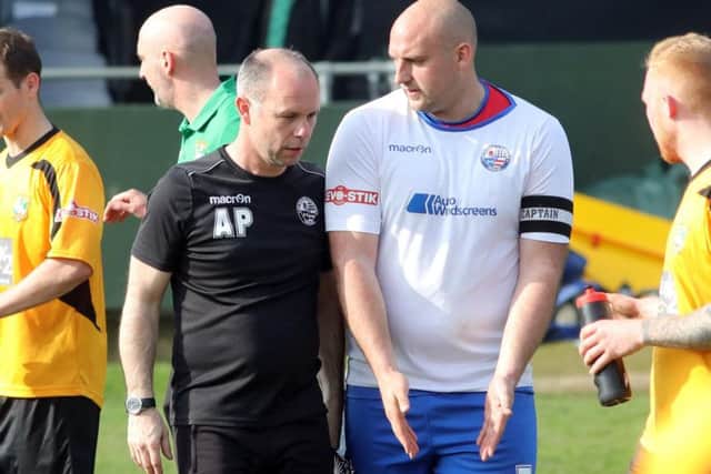 Boss Andy Peaks and captain Liam Dolman will be hoping to lead AFC Rushden & Diamonds to another win in their promotion bid this weekend