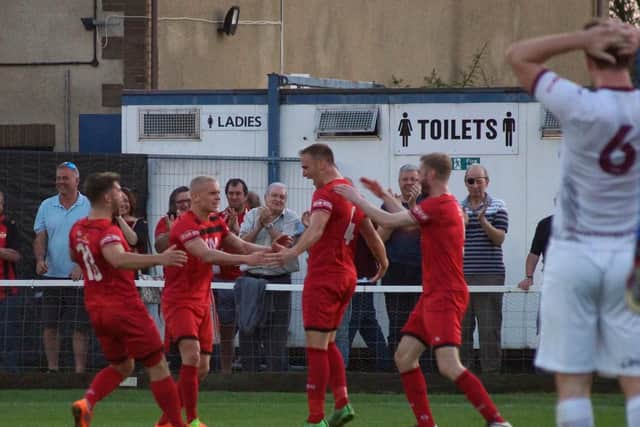 Brett Solkhon celebrates his and Kettering Town's second goal in the 2-0 win over Weymouth at Latimer Park. Pictures by Peter Short