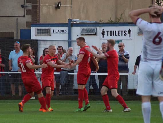 Brett Solkhon celebrates his and Kettering Town's second goal in the 2-0 win over Weymouth at Latimer Park. Pictures by Peter Short