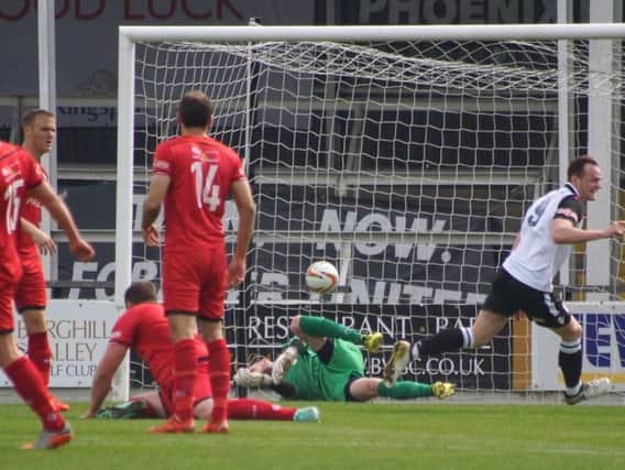 Hereford score one of their four goals as Kettering Town slipped to a 4-1 defeat at Edgar Street. Pictures by Peter Short